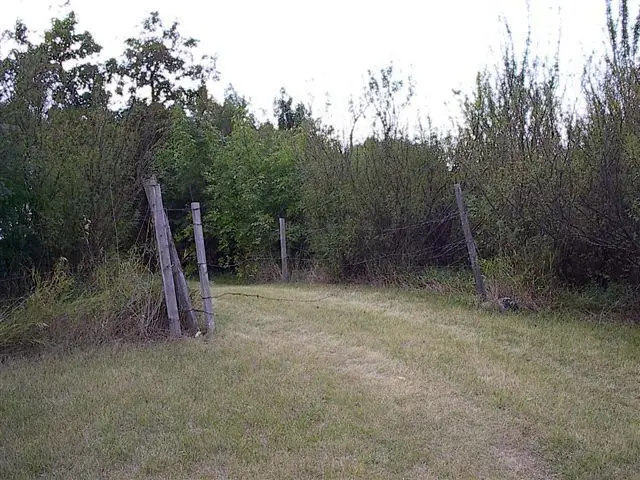 Fence gate at the Mitchell cottage entrance